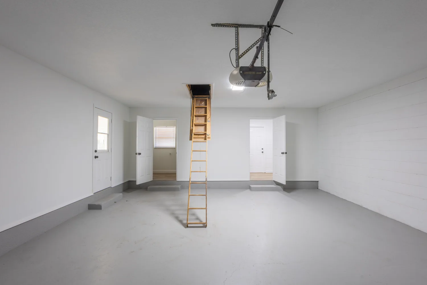 Open living room with polished concrete floor